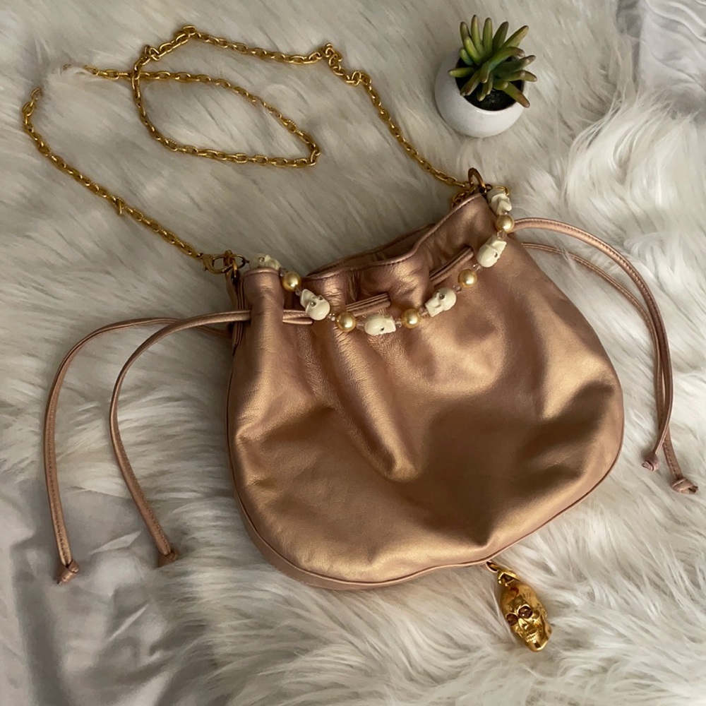 Tarina Tarantino rose gold purse